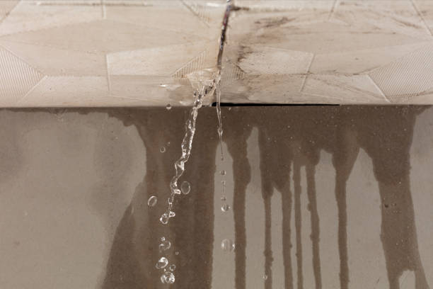 Professional Flood Damage Cleanup technician working in Fayetteville, TX